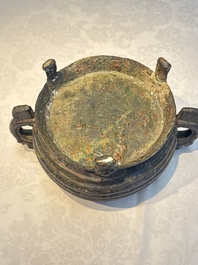 A Chinese archaic ritual tripod food vessel with Taotie design, 'Gui 簋', Western Zhou