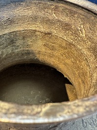 A Chinese archaistic bronze vase with Taotie handles, 'Hu 壺', Ming