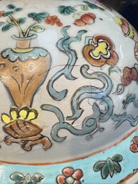 A pair of Chinese famille rose 'Antiquities' covered vases and a dish, 19th C.