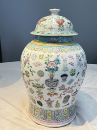 A pair of Chinese famille rose 'Antiquities' covered vases and a dish, 19th C.