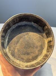 A Chinese archaistic bronze vase with Taotie handles, 'Hu 壺', Ming
