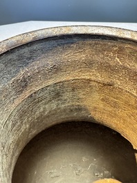 A Chinese archaistic bronze vase with Taotie handles, 'Hu 壺', Ming
