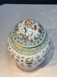 A pair of Chinese famille rose 'Antiquities' covered vases and a dish, 19th C.