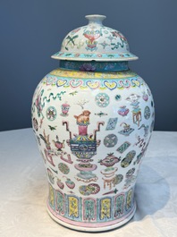 A pair of Chinese famille rose 'Antiquities' covered vases and a dish, 19th C.