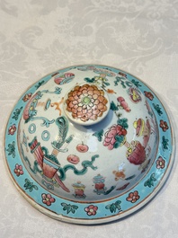 A pair of Chinese famille rose 'Antiquities' covered vases and a dish, 19th C.