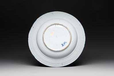 A blue and white 'figures in a garden' chinoiserie dish, Frankfurt, 17th C.