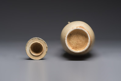 A large Chinese qingbai covered urn applied with immortals and a dragon, Northern Song