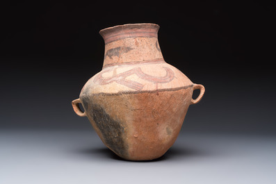 A Chinese painted pottery jar with handles, Late Bronze Age, Xindian culture, 13/10th C. B.C.