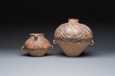 A Chinese painted pottery pouring vessel and a jar with geometric design, Neolithic period, Majiayao culture, 3rd millennium B.C.