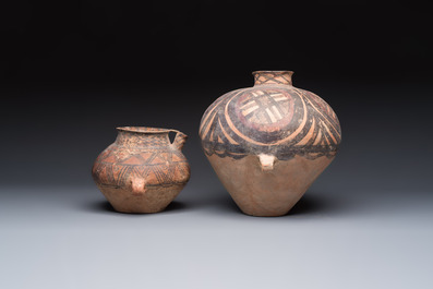 A Chinese painted pottery pouring vessel and a jar with geometric design, Neolithic period, Majiayao culture, 3rd millennium B.C.