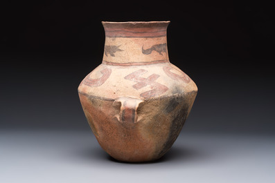 A Chinese painted pottery jar with handles, Late Bronze Age, Xindian culture, 13/10th C. B.C.