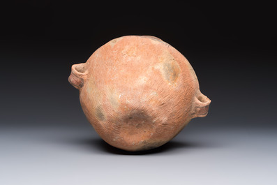 A Chinese painted pottery jar with handles, Late Bronze Age, Xindian culture, 13/10th C. B.C.