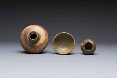 A varied group of 12 glazed pottery wares, 20th C.