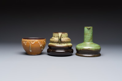 A varied group of 12 glazed pottery wares, 20th C.
