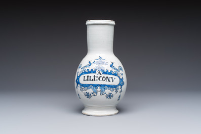Five blue and white Dutch Delft and Brussels faience drug jars, 18th C.