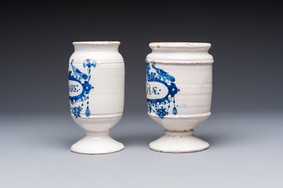 Five blue and white Dutch Delft and Brussels faience drug jars, 18th C.