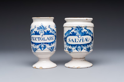 Five blue and white Dutch Delft and Brussels faience drug jars, 18th C.