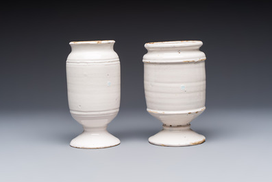 Five blue and white Dutch Delft and Brussels faience drug jars, 18th C.