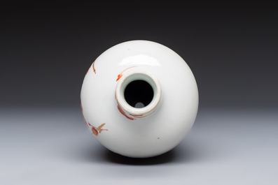 A Chinese iron-red and gilt-decorated vase with a narrative design, Qianlong mark, 19th C.
