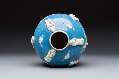 A Chinese sgraffiato blue-ground 'Luohan' vase with relief design, 19th C.