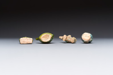 A group of ten Chinese glazed pottery mingqi, Ming