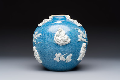 A Chinese sgraffiato blue-ground 'Luohan' vase with relief design, 19th C.
