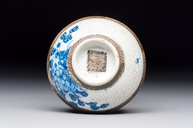 Three Chinese Nanking crackle-glazed vases, a blue and white vase, a bowl and a jar with a wooden cover, Yongzheng and Chenghua marks, 19th C.