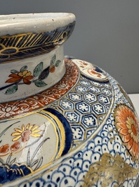 An exceptional polychrome Dutch Delft five-piece garniture in Chinese Kangxi style, first quarter 18th C.