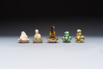 A group of ten Chinese glazed pottery mingqi, Ming