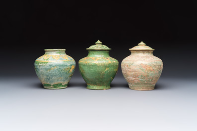 Three Chinese sancai-glazed pottery jars, two with cover, Ming or earlier