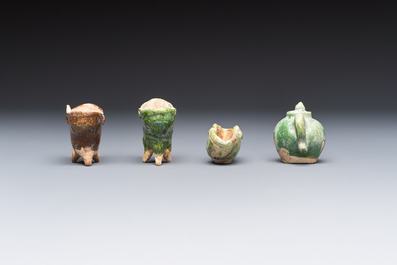 A group of ten Chinese glazed pottery mingqi, Ming
