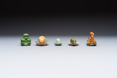 A group of ten Chinese glazed pottery mingqi, Ming