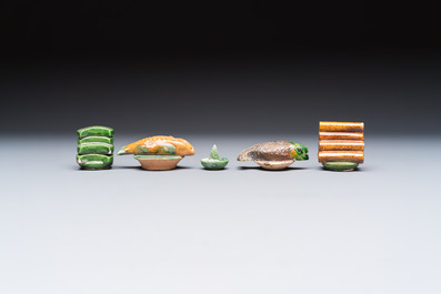 A group of ten Chinese glazed pottery mingqi, Ming