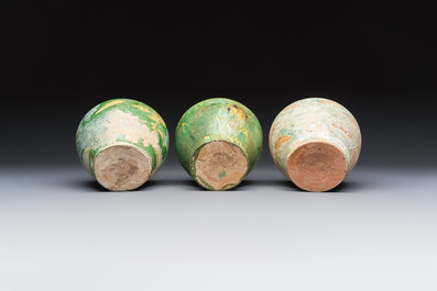 Three Chinese sancai-glazed pottery jars, two with cover, Ming or earlier
