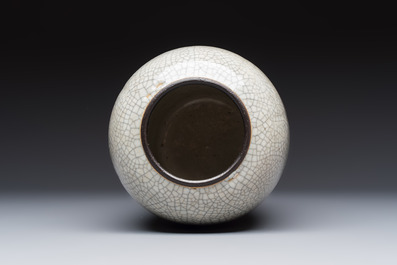Three Chinese Nanking crackle-glazed vases, a blue and white vase, a bowl and a jar with a wooden cover, Yongzheng and Chenghua marks, 19th C.