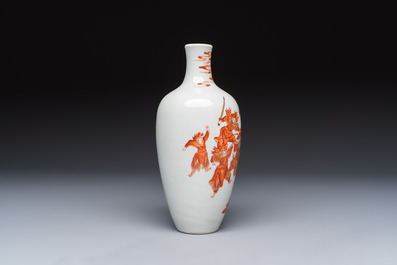 A Chinese iron-red and gilt-decorated vase with a narrative design, Qianlong mark, 19th C.