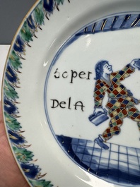 A rare Chinese doucai 'Commedia dell&rsquo;arte' 'South Sea Bubble' plate, Kangxi, ca. 1720