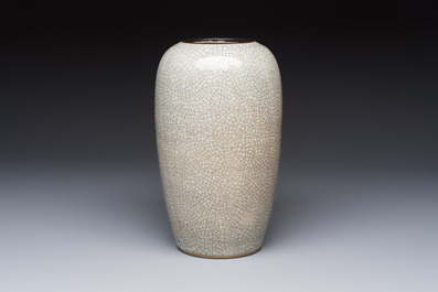 Three Chinese Nanking crackle-glazed vases, a blue and white vase, a bowl and a jar with a wooden cover, Yongzheng and Chenghua marks, 19th C.