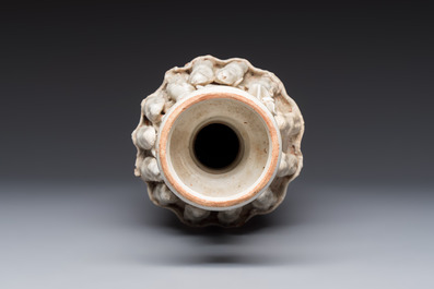 A Chinese qingbai urn applied with immortals and a dragon, Northern Song