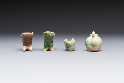 A group of ten Chinese glazed pottery mingqi, Ming