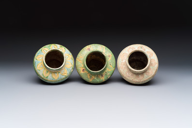 Three Chinese sancai-glazed pottery jars, two with cover, Ming or earlier