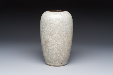 Three Chinese Nanking crackle-glazed vases, a blue and white vase, a bowl and a jar with a wooden cover, Yongzheng and Chenghua marks, 19th C.