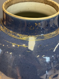 A Chinese gilt-decorated powder-blue-ground 'Phoenix among Blossoming Branches' vase, Qianlong