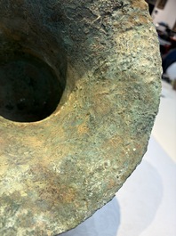 A Chinese archaic bronze ritual wine vessel with Taotie design, 'Zun 尊', Shang