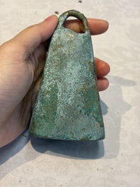 Seven various Chinese bronze and cast-iron bells, Han and later
