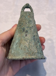 Seven various Chinese bronze and cast-iron bells, Han and later