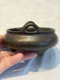 A Chinese bronze handled tripod censer, Yu Tang Jing Wan 玉堂精玩 mark, 17th C.
