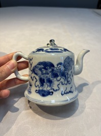 A Chinese blue and white 'Buddhist Lion' teapot, covered bowl and a saucer, various marks, 19th C.