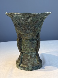 A Chinese archaic bronze ritual wine vessel with Taotie design, 'Zun 尊', Shang