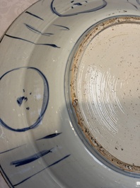 A very large Chinese blue and white 'Kraak' dish with geese by the water, Wanli